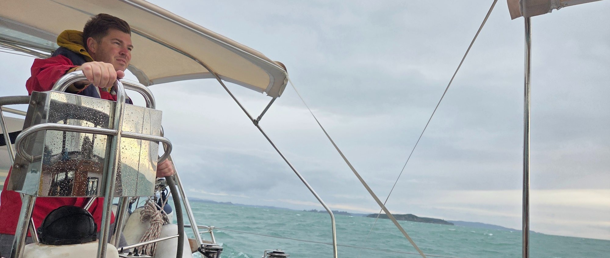 Joel Costello at the helm on the Hauraki Gulf